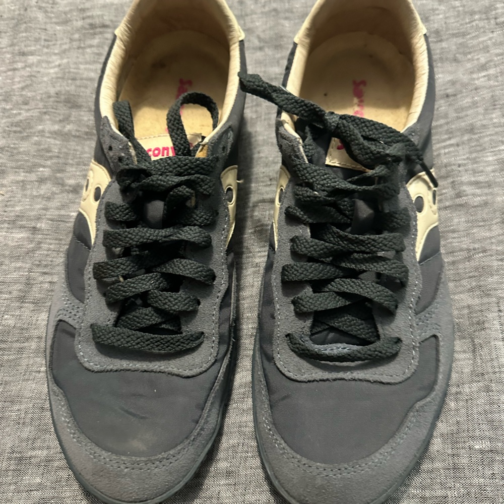 Saucony women’s Black and Cream Sneakers